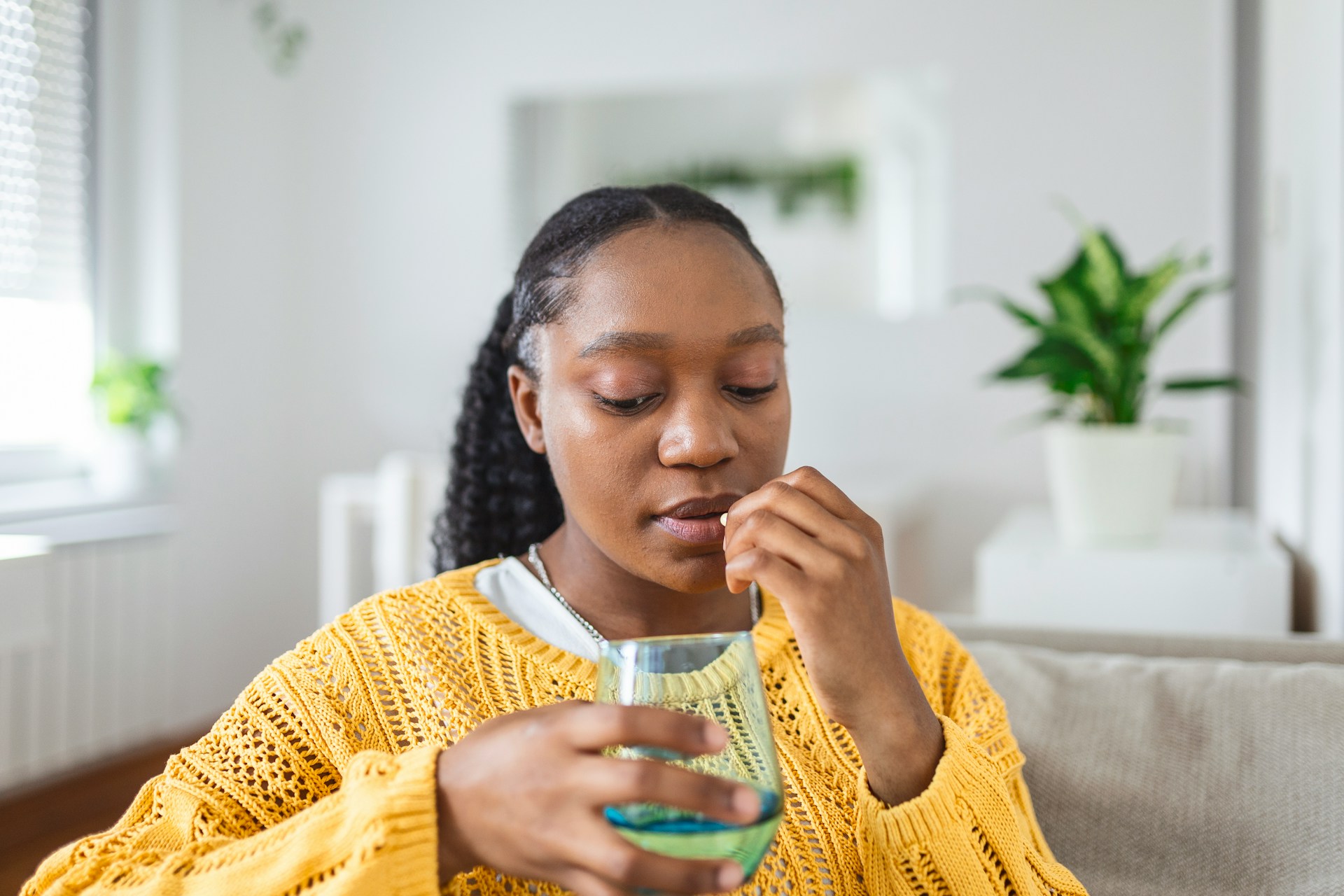 woman drinking medicine, Cold and Flu